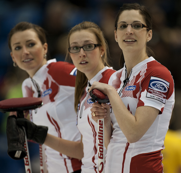From left, Team Canada's Emma Miskew, Alison Kreviazuk and Lisa Weagle were a pleased bunch of curlers after Saturday's win over Russia. (Photo, CCA/Michael Burns)