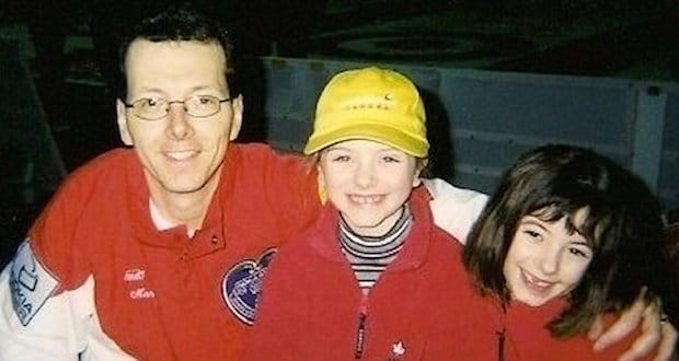 Sisters Cathlia (left) and Jamie (right) and with their father, Mark Ward at the 2003 Tim Hortons Brier in Halifax where Mark played lead for Brad Gushue.