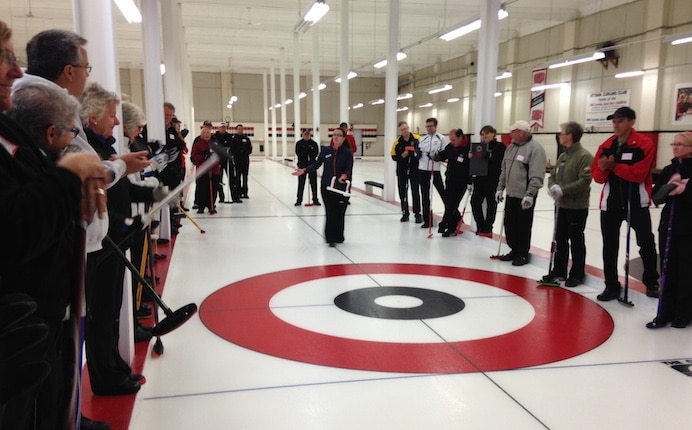 Train the Trainer leader Anna Keller leads a session on the ice at the Ottawa Curling Club (Photo courtesy Ottawa Curling Club)