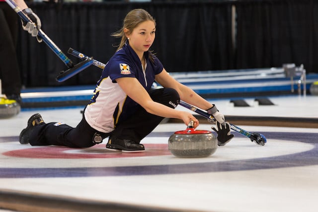 Karlee Burgess delivers her rock during competition at the 2015 Canada Winter Games (Photo CWG/Chris Leboe)