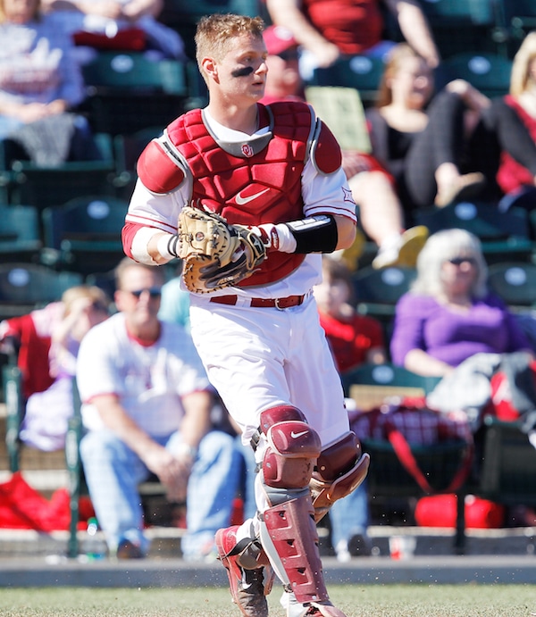 Chris Shaw sees a lot of similarities in his role as a catcher and a skip. Both positions require him to be aware of what is going on around him at all times, including during this Feb. 14 game against Southern Illinois-Edwardsville. (Photo courtesy University of Oklahoma Athletics)
