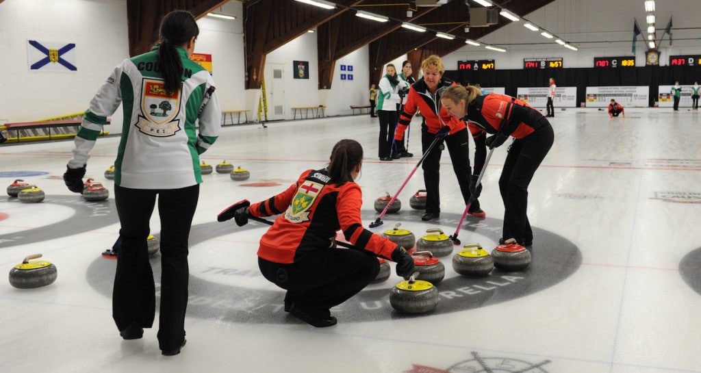 Ontario and PEI women in action in Draw 14 action at the 2015 Travelers Curling Club Championship in Ottawa (Curling Canada/Claudette Bockstael Photo)