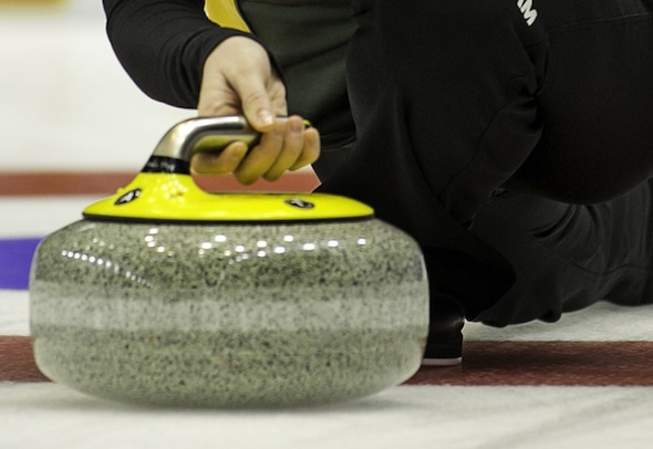 Team Northern Ontario skip Tracy Horgan throws her rock in fourth draw action at the 2015 Scotties Tournament of Hearts, the Canadian Womens Curling Championships, Moose Jaw, Saskatchewan