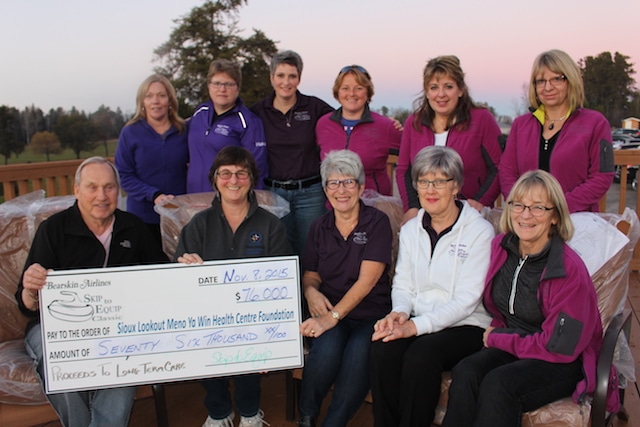 The organizing committee of the Skip to Win bonspiel presents a cheque for $76,000 to the Sioux Lookout Meno Ya Win Health Centre Foundation (Photo courtesy of Muriel Anderson)