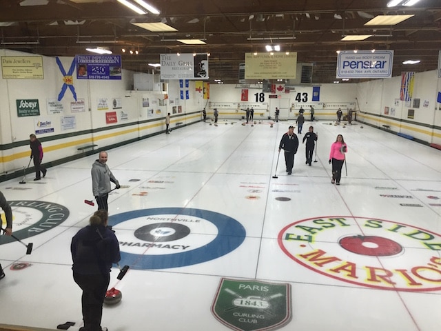 New curlers get into the action at the Paris Curling Club (Photo by Tim Risebrough)