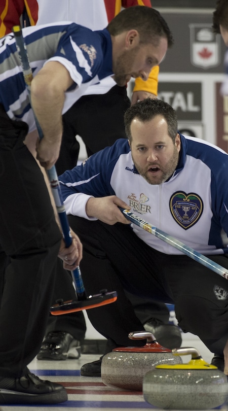 Nova Scotia skip Jamie Murphy instructs sweeper Scott Saccary during Friday's pre-qualifying game. (Photo, Curling Canada/Michael Burns)