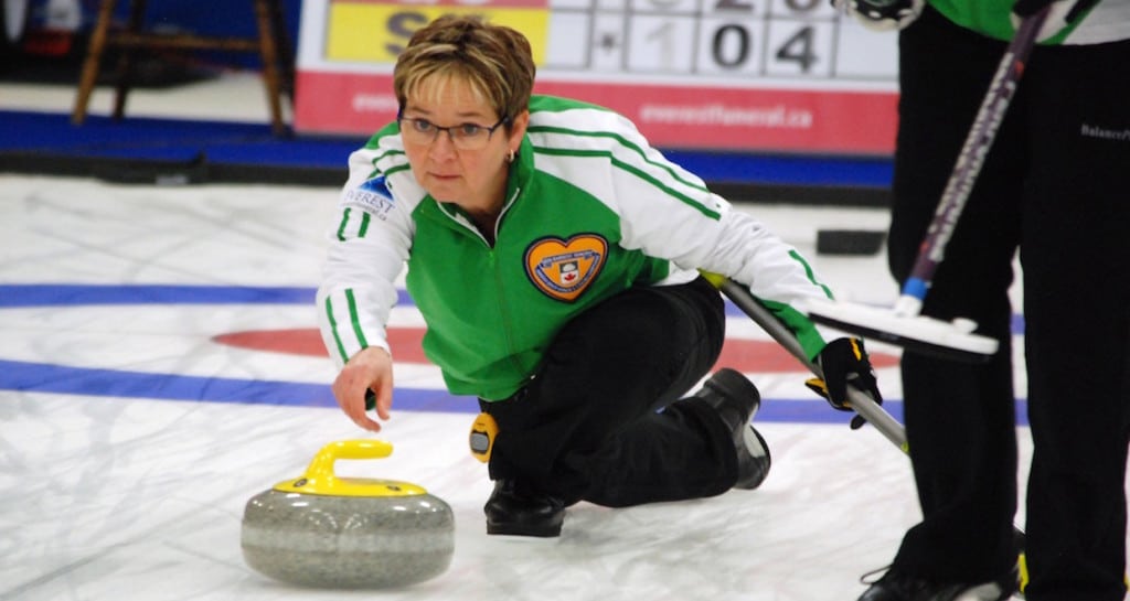 Sherry Anderson of Saskatchewan delivers her rock in a 6-5 win over Alberta to remain undefeated at the 2016 Canadian Seniors Curling Championship (Curling Canada/Mike Lewis photo)