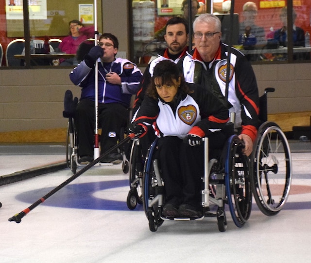 Ontario skip Colinda Joseph delivers her rock at the Callie Curling Club in Regina during the 2016 Canadian Wheelchair Curling Championship (Curling Canada/Morgan Daw photo)
