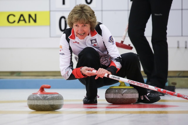 Team Canada skip Terri Loblaw calls to her sweepers during Tuesday's action at the World Senior Curling Championships in Karlstad, Sweden (WCF/Céline Stucki photo)