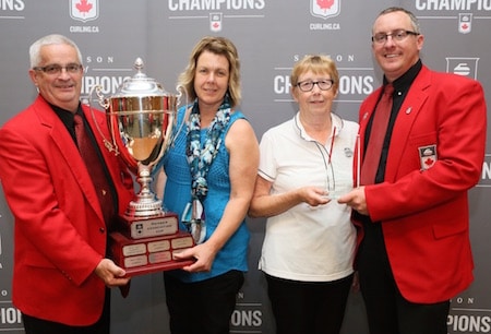 Alberta won the 2015-16 MA Cup, presented by TSN. Governors Ron Hutton, left, and Scott Comfort, right, present the MA Cup to Brenda Asmussen, left, and Joan Westgard of the Alberta Curling Federation. (Photo, Curling Canada/Neil Valois)