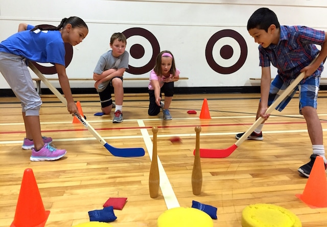The new PHE Canada Move Think Learn: Focus on Curling resource for teachers includes curling-specific gym activities such as aiming at a target and maintaining balance while throwing. (Photo by Helen Radford)