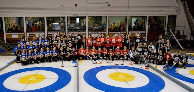 Participants of Reid Carruthers’ curling camp gather on the ice at the St. Vital Curling Club in Winnipeg (Photo courtesy Reid Carruthers)