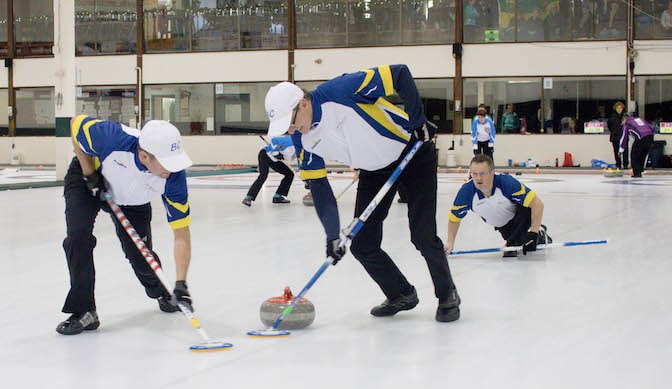 B.C. third Norm Coté calls to sweepers Craig Bernes and Darren Richards during tiebreaker action at the 2016 Travelers Curling Club Championship in Kelowna, B.C. (Curling Canada/Jessica Krebs photo)