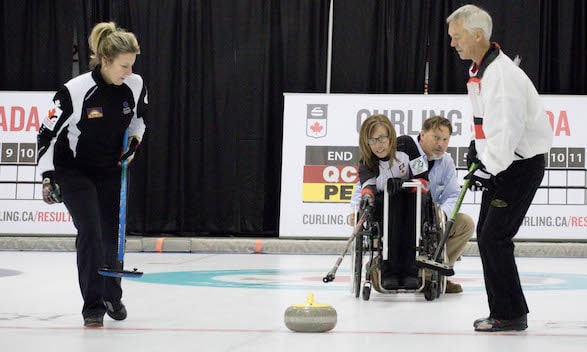Paralympic gold-medallist Sonja Gaudet delivers the ceremonial first rock of the 2016 Travelers Curling Club Championship, with sweepers Sasha Carter and Pat Ryan alongside (Curling Canada photo)