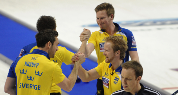 It was handshakes all around for Team Sweden after their Page playoff 1-2 victory over Scotland on Friday. (Photo, CCA/Michael Burns)
