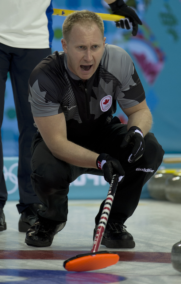 Team Canada skip Brad Jacobs instructs his sweepers during Tuesday's game against Sweden. (Photo, CCA/Michael Burns)