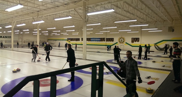 Action on the ice at Edmonton's Granite Club during Curling with Pride's league play (Photo James Fox)
