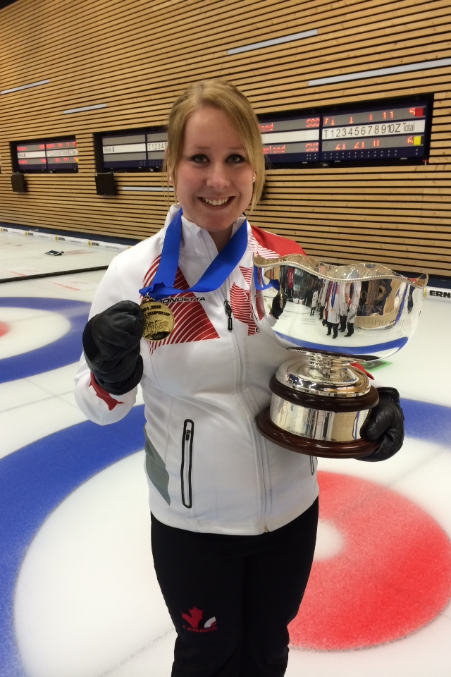 Keely Brown shows off her medal and trophy after the gold medal game at the 2014 World Junior Curling Championships (Photo courtesy K. Brown)