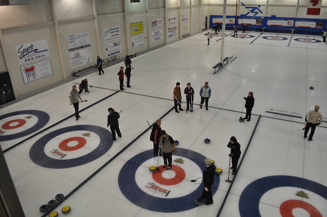 Action on the ice during one of the many leagues offered to almost 1000 curlers at the Sherwood Park Curling Club (Photo Dan Girard)