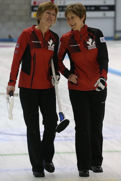 Canadian second Shelley MacNutt shares a laugh with skip Colleen Pinkney at the 2014 World Senior Curling Championships  in Dumfries, Scotland (Photo WCF/Richard Gray)