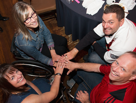 Wheelchair Curling's Ina Forrest, Sonja Gaudet, Mark Ideson and Dennis Thiessen show off their Paralympic Rings during the Celebration of Excellence Paralympic Ring Reception in Calgary. (Photo: Matthew Murnaghan/Canadian Paralympic Committee)