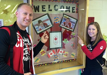 Brad Jacobs and Kaitlyn Lawes were welcomed warmly at St. Anthony's School in Calgary on Thursday. (Photo, CCA)